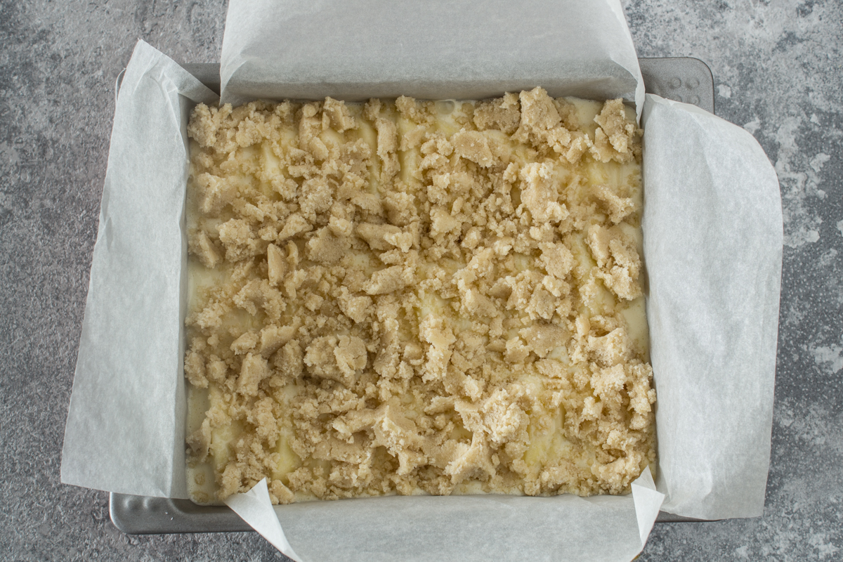 Streuselkuchen mit Äpfeln und Cheesecake-Masse - Saftiges Rezept